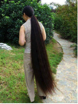 Despite her husband’s repeated requests, she hasn’t had a haircut in 25 years.