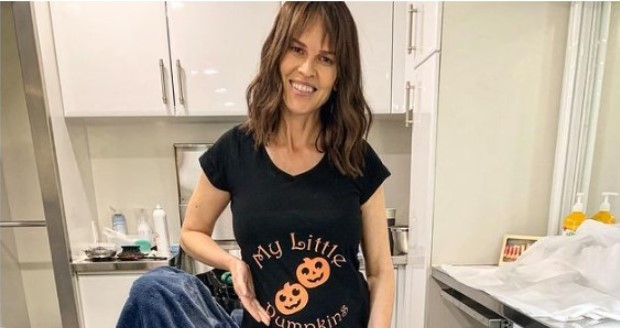 Hilary Swank glows in Christmas update as she shows off twin baby bump